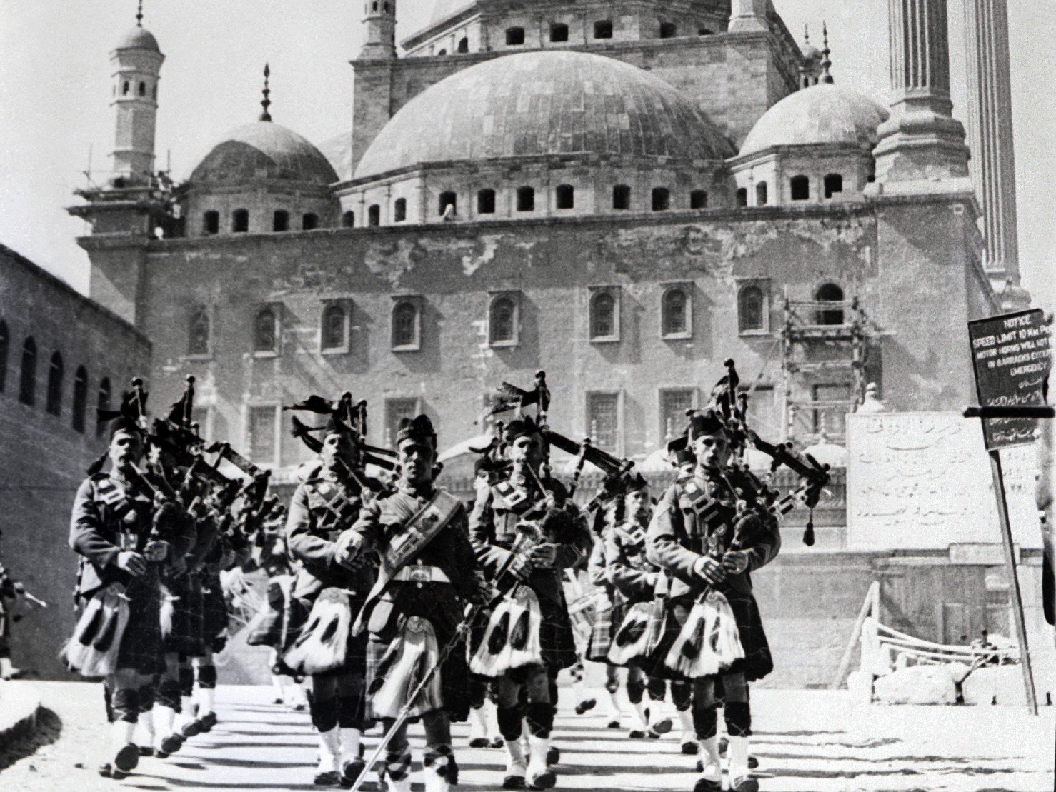 An undated photo of British troops, the Highlanders, playing bagpipes in front of the Cairo Citadel in Egypt (AFP)