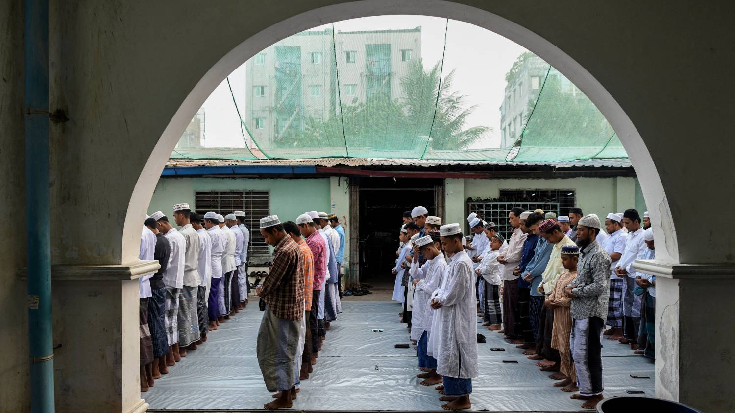 Muslims in Myanmar offer Eid morning prayers in congregation (Aung Main/AFP)