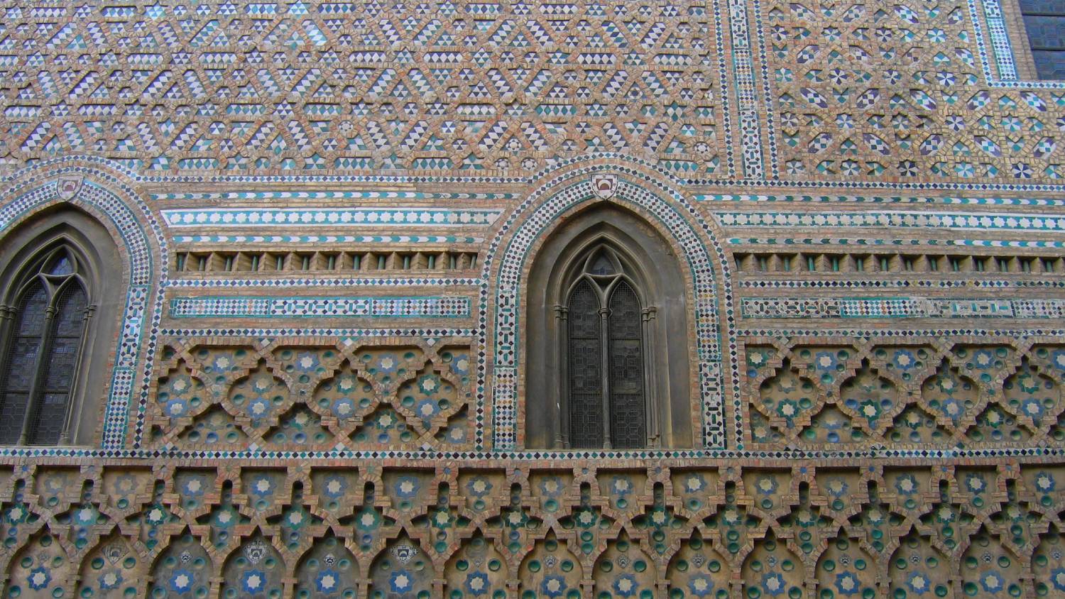 Mudejar tilework seen here on a building facade in Aragon, Spain (Wikipedia)