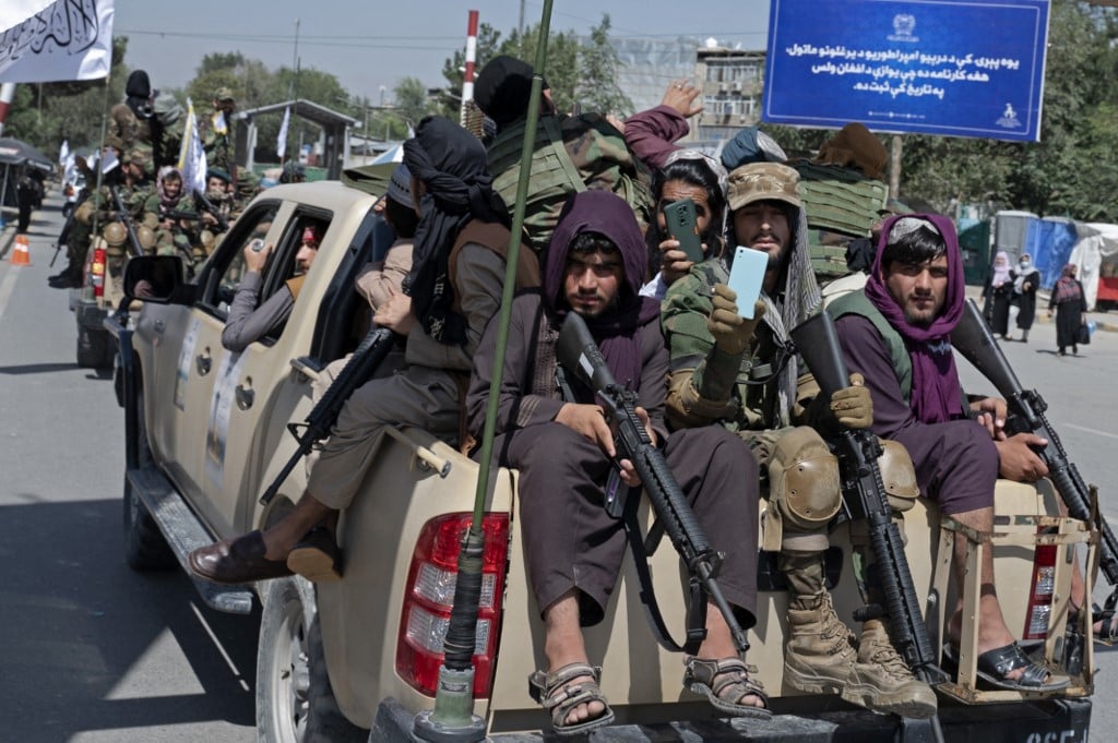 Taliban fighters in Kabul on 31 August 2022 (AFP)