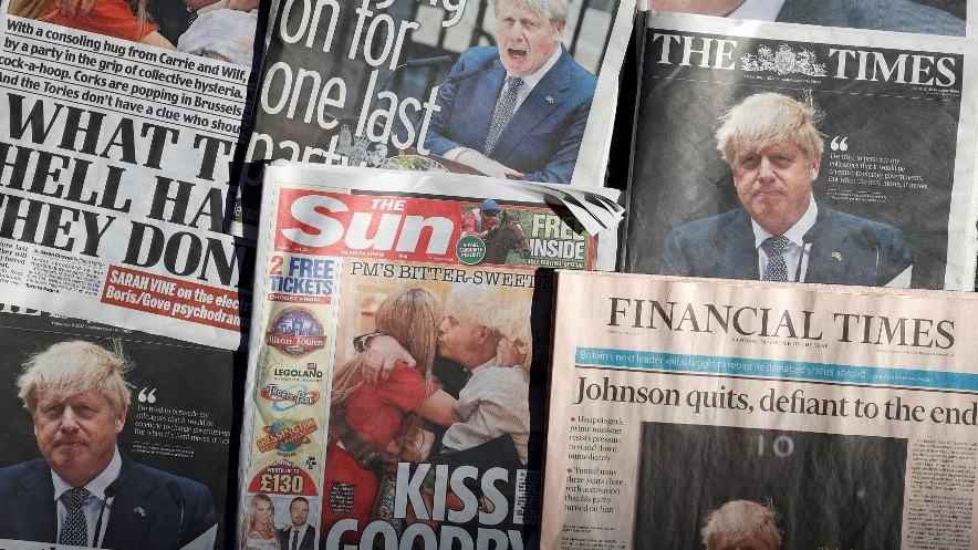 Front pages of British national newspapers are pictured in London in July 2022 (AFP)