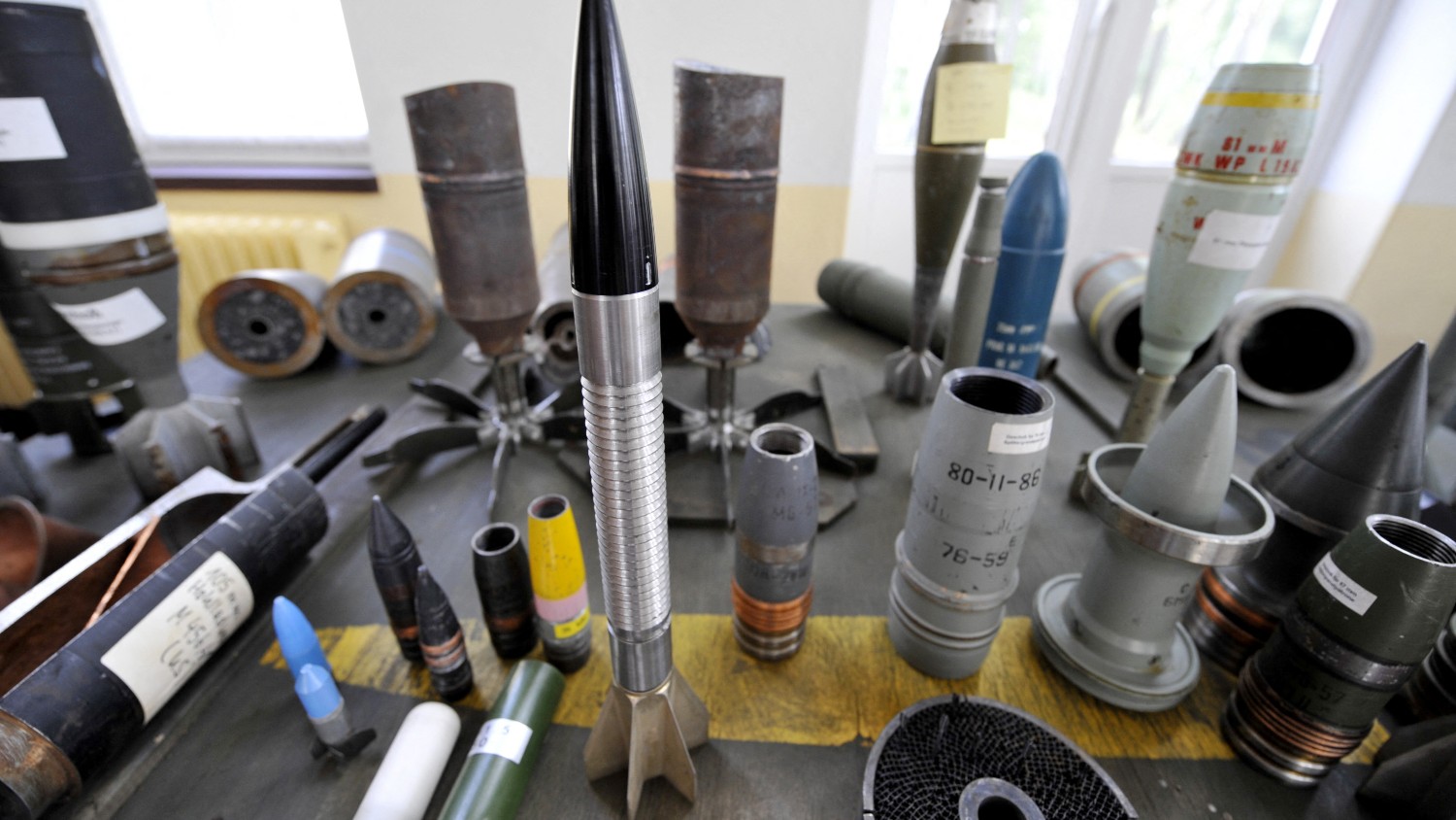 Various types of mortar rounds and other projectiles are on display at the Spreewerk ISL Integrated Solutions weapons decommissioning facility near Luebben June 23, 2009. A two-day conference on the destruction of cluster munitions stockpiles begins in Berlin June 25, 2009.