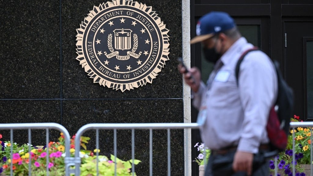 The FBI seal is seen outside its headquarters in Washington on 15 August 2022 (AFP)
