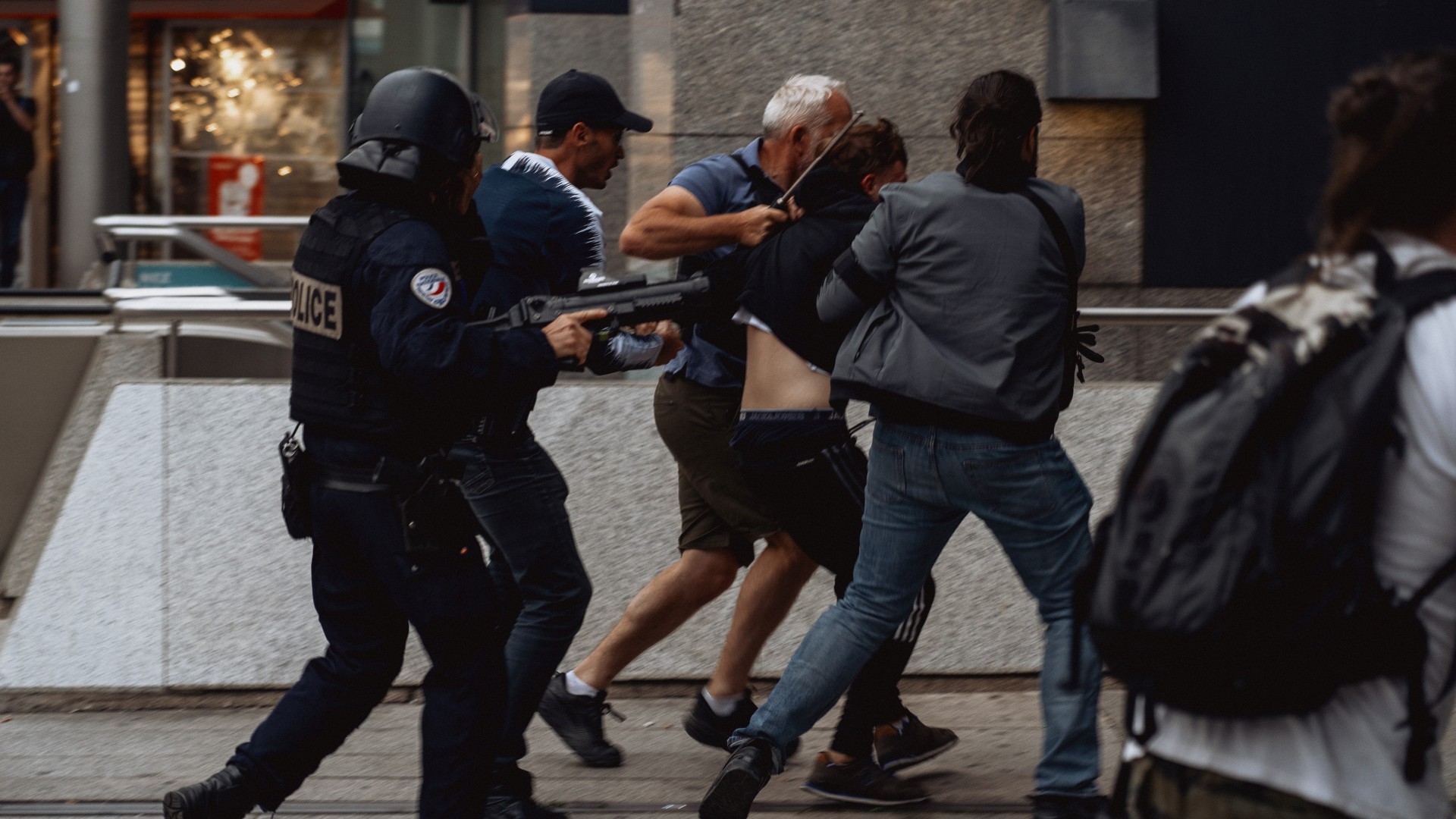 Police grapple with protesters in Nanterre, 29 June (MEE/Alexandre Rito)