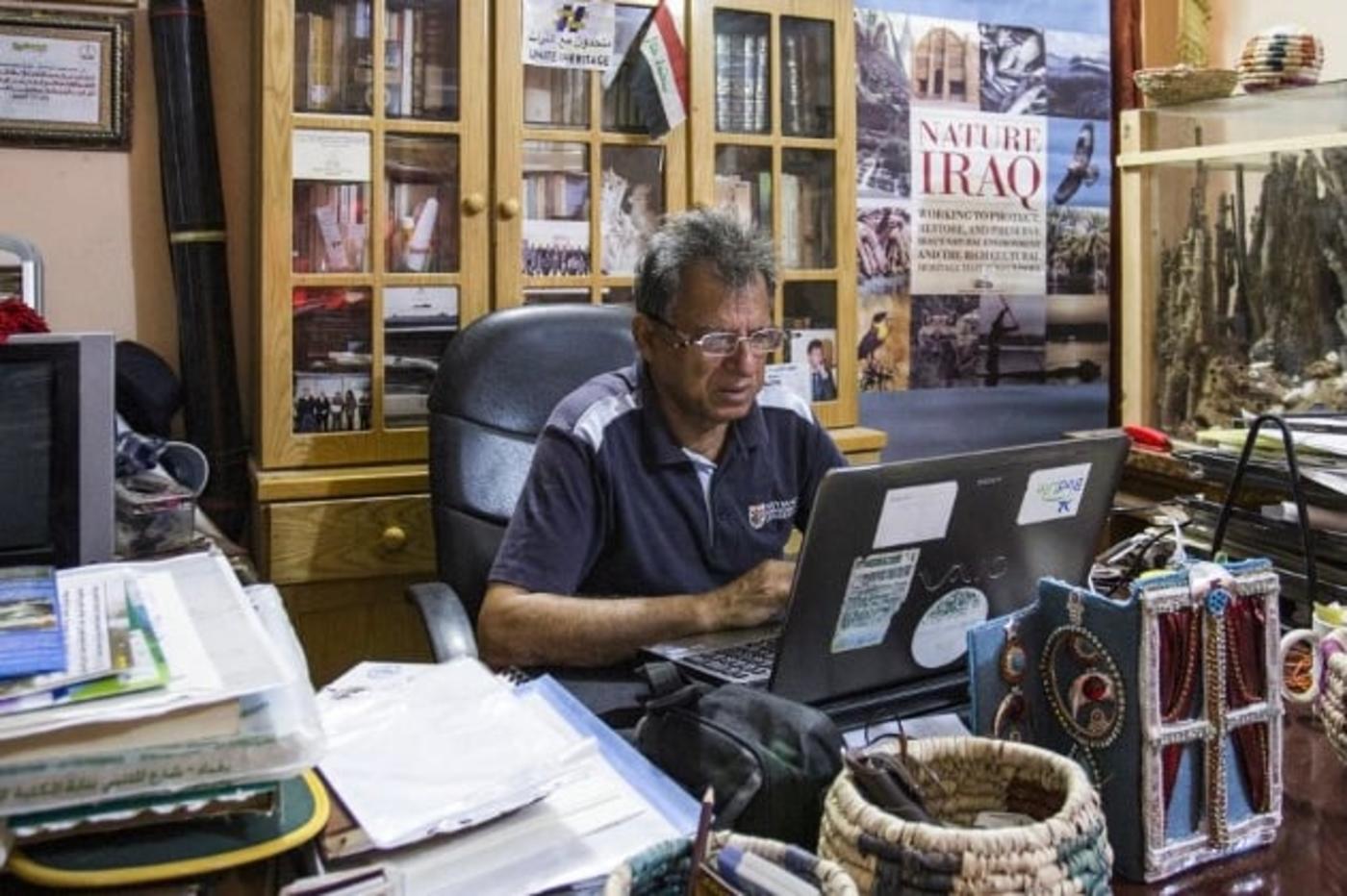 Jassim al-Assadi, director of Nature Iraq, in his office in Chibayish, 120kms northwest of the southern city of Basra, 29 March 2019 (AFP)