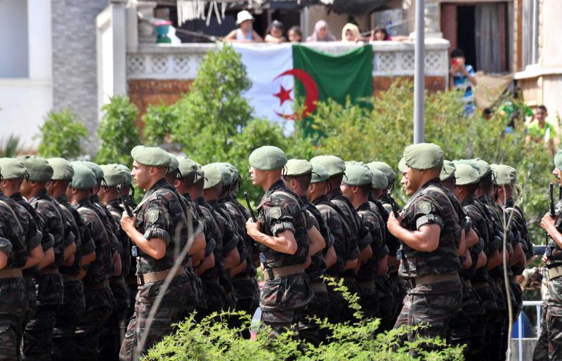 Algerian soldiers at a military parade in Algiers, on 5 July 2022, as the country celebrates the 60th anniversary of its independence (AFP)