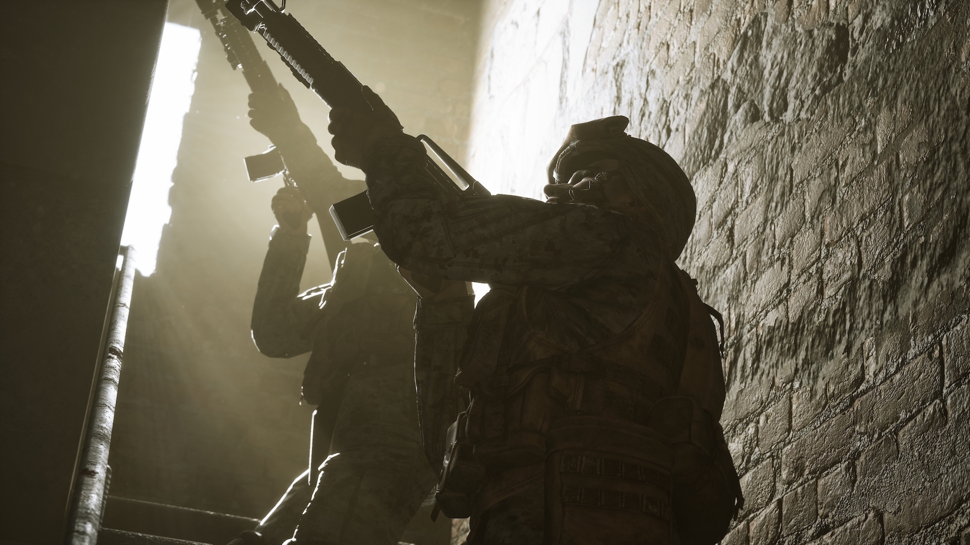 Gameplay screenshot of a US soldier advancing up a flight of stairs during a tactical raid with his rifle raised