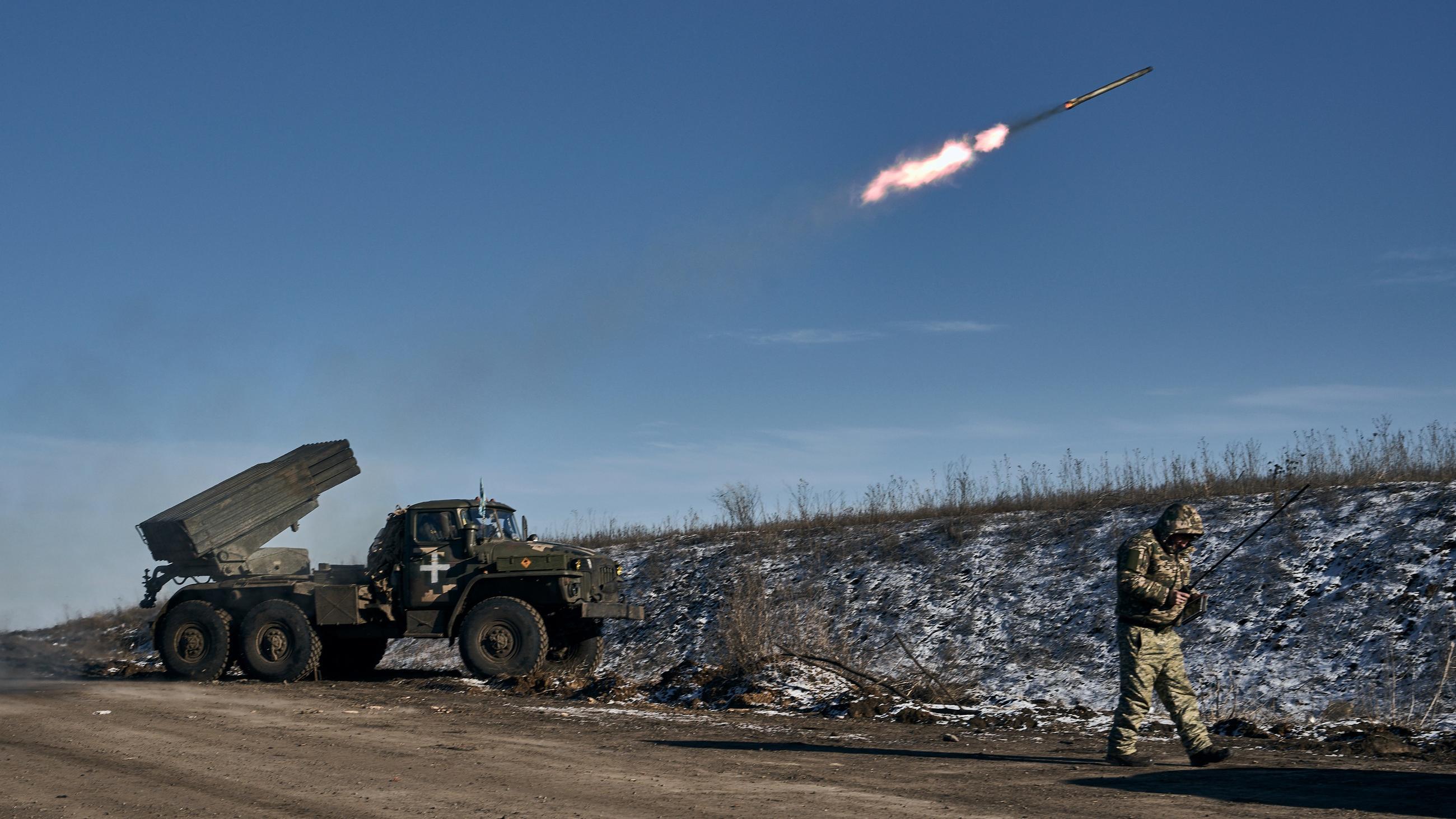 Ukrainian army Grad multiple rocket launcher fires rockets at Russian positions in the frontline near Soledar, Donetsk region, Ukraine, Wednesday 11 January 2023 (AP)
