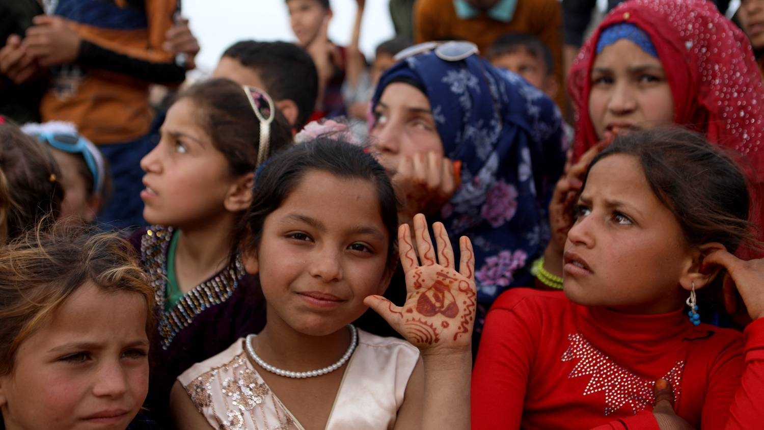 Syrian children celebrate Eid at a camp for internally displaced people in Sarmada, Idlib (AFP/Aaref Watad)