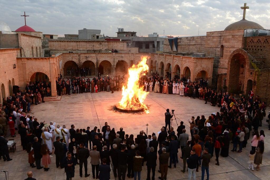 A unique Christmas tradition celebrated in Iraq, and sometimes also Syria, involves a bonfire of dried thorned branches (AFP)
