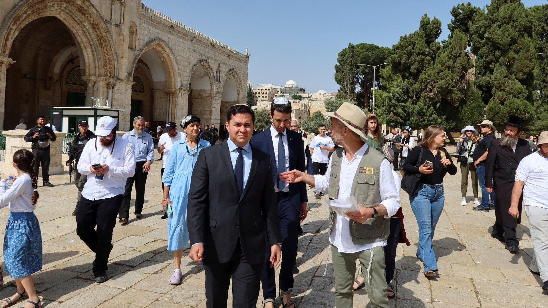 Israeli Knesset members in the courtyards of Al-Aqsa Mosque, occupied East Jerusalem, during a settler incursion on 18 May 2023 (AFP)