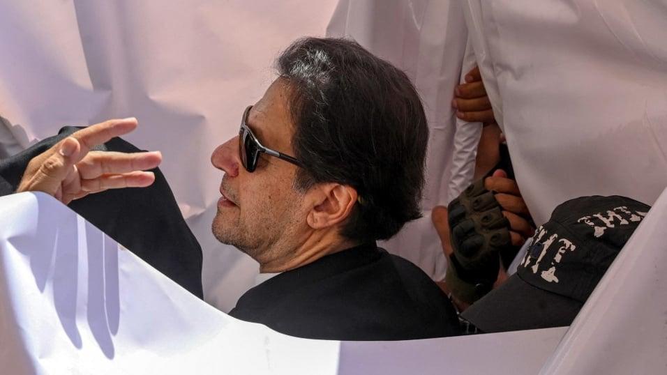 Former Pakistani Prime Minister Imran Khan arrives for a court appearance in Lahore on 15 May 2023 (AFP)