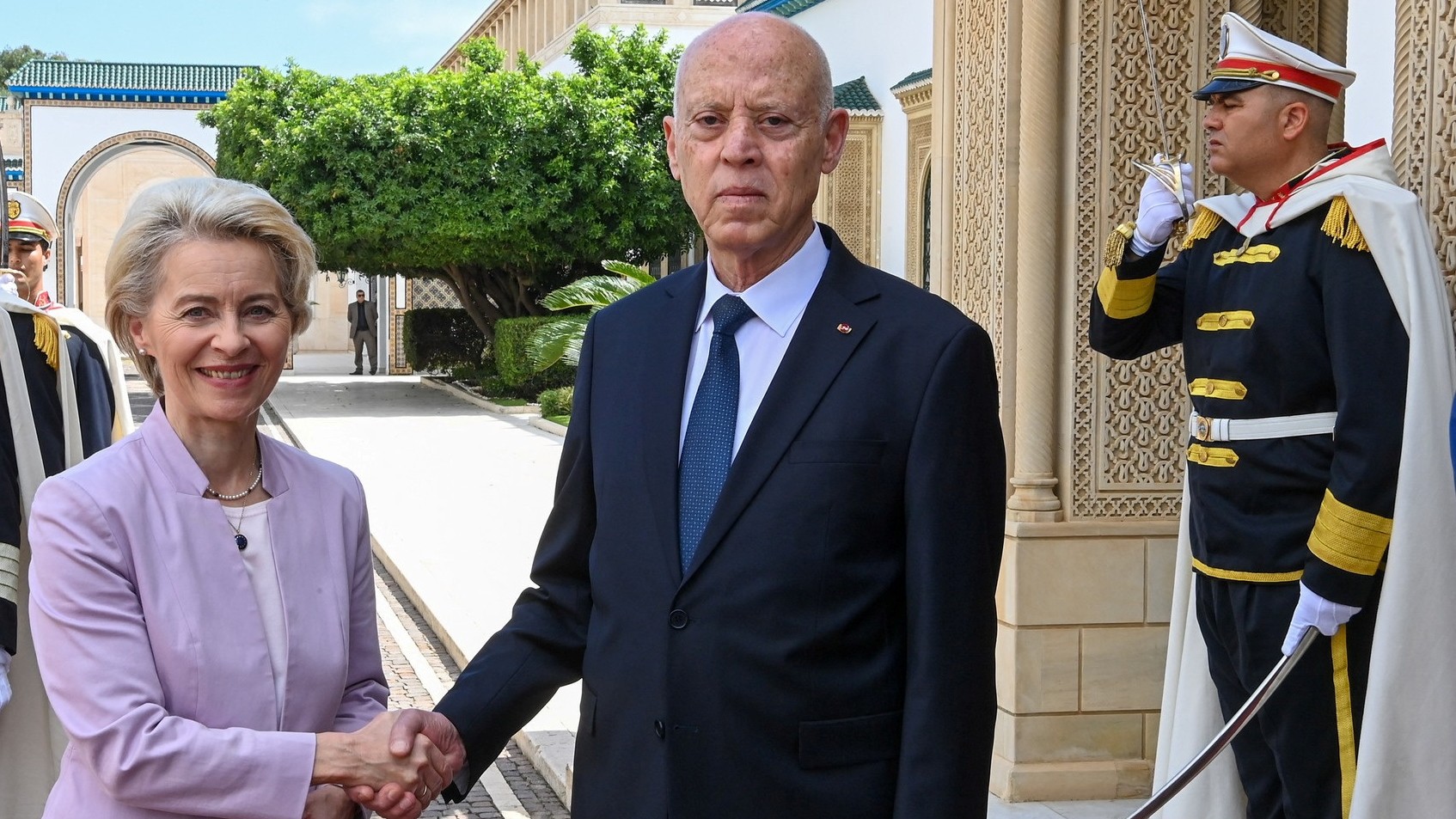 Tunisia's President Kais Saied shakes hands with European Commission President Ursula von der Leyen in Tunis, Tunisia June 11, 2023