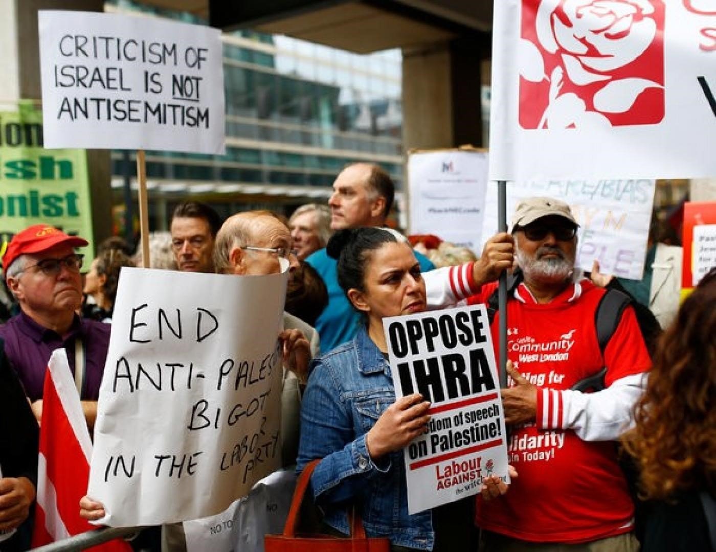 Labour Party supporters protest against the expulsion of party members accused of anti-Semitism outside the party's National Executive Committee meeting in London (Reuters)